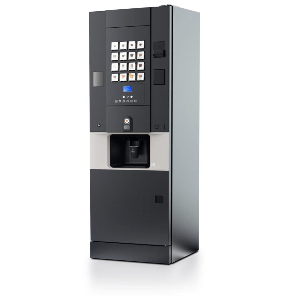 Een Rhea Vendors rhFS1.buttonsI8R4_5_ vrijstaande koffieautomaat met fysieke drukknoppen voor een overzichtelijke en eenvoudige bediening, opgesteld in de ontmoetingsruimte voor het zetten van vers gezette koffiespecialiteiten.